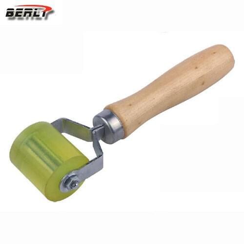 roller for gluable wheel balancing weights
